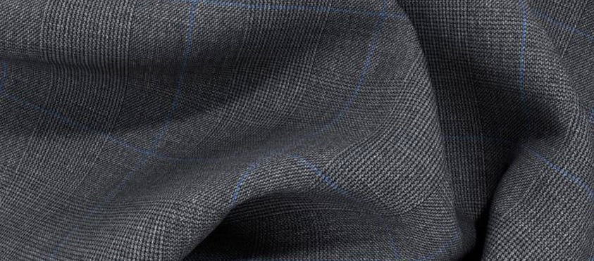 Close-up of draped gray wool fabric with a fine textured weave and thin blue windowpane check lines