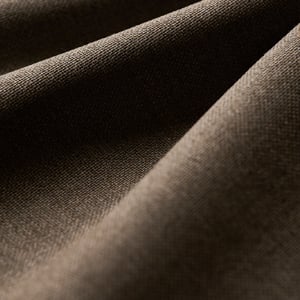 Close-up of dark brown woolen fabric with soft folds and a fine woven texture