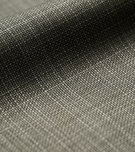 Close-up of a gray woven wool fabric with a fine, textured weave and soft folds