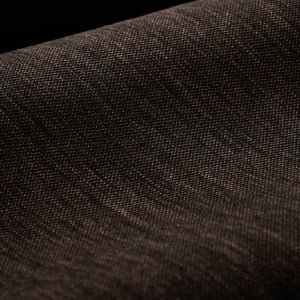 Close-up of a dark brown woven wool fabric with a fine texture and soft folds