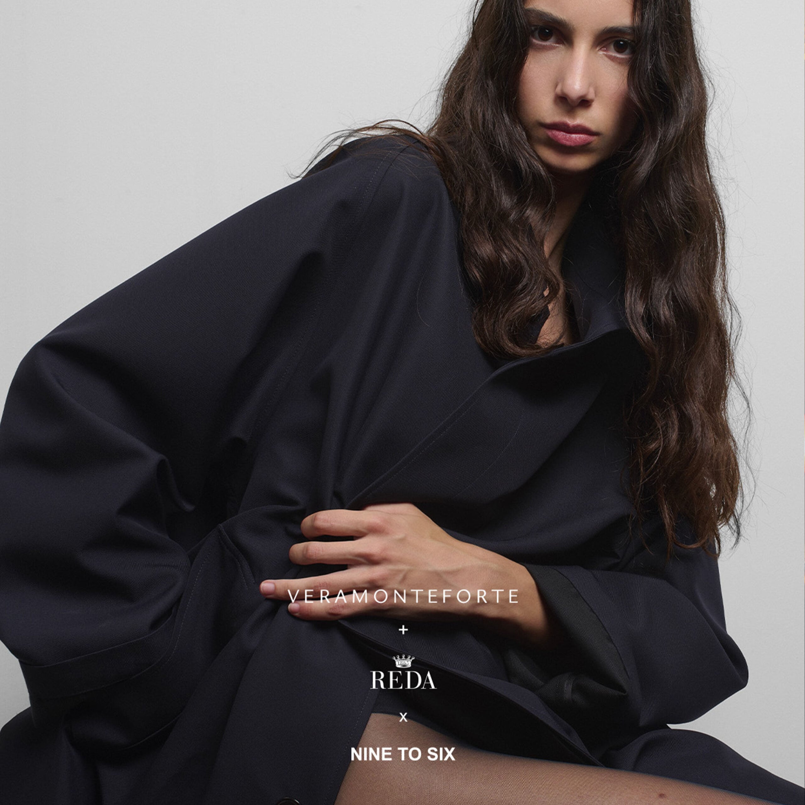 Woman in an oversized navy coat; text: Veramonteforte + Reda x Nine to Six