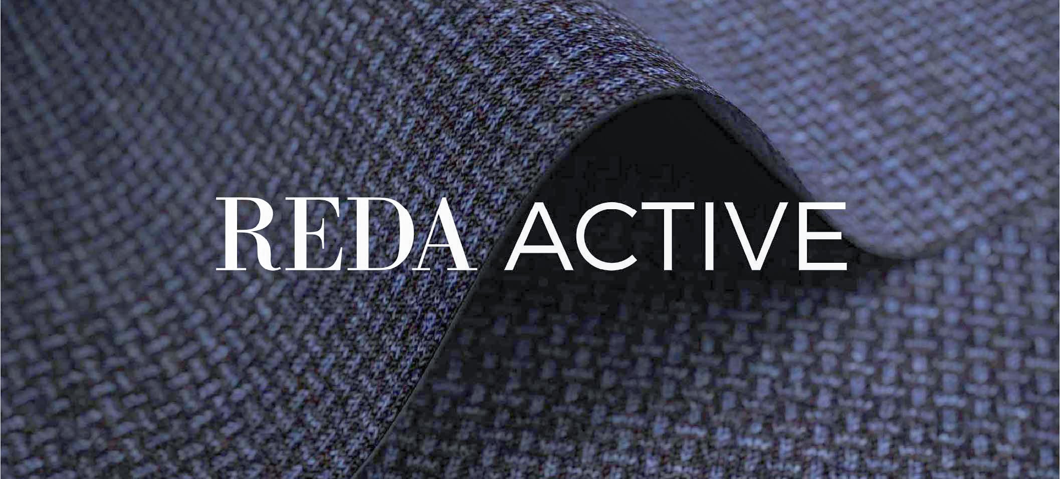 Close-up of folded blue textured fabric with the REDA ACTIVE logo