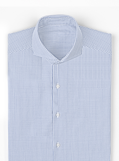 Folded blue and white striped dress shirt with a cutaway collar and white buttons